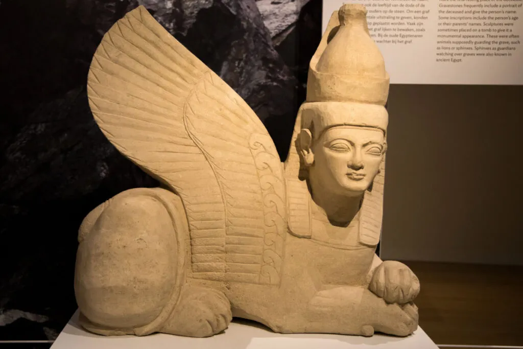 Sphinx statue with egyptian pschent crown from ancient Cyprus. 600-500 BC. Lion Sphinx